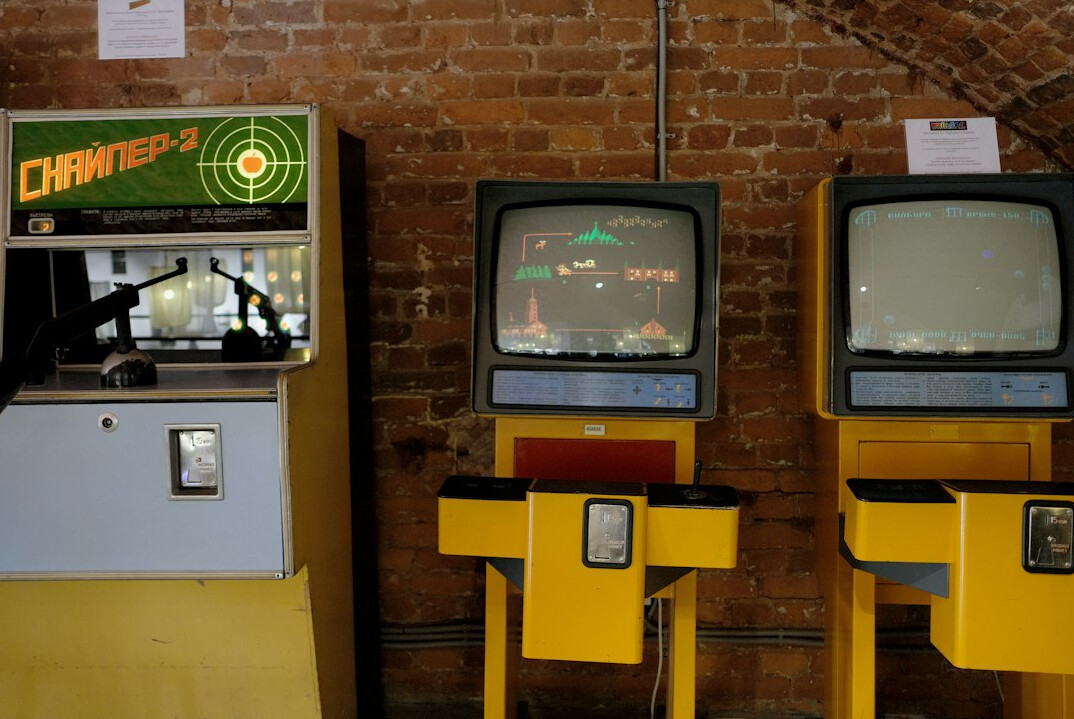 Multiple vintage television cameras pointed at a classic game show set